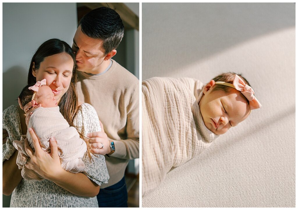 mom and dad holding their new baby girl while sunshine fills the living room